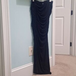 Long black slitted skirt